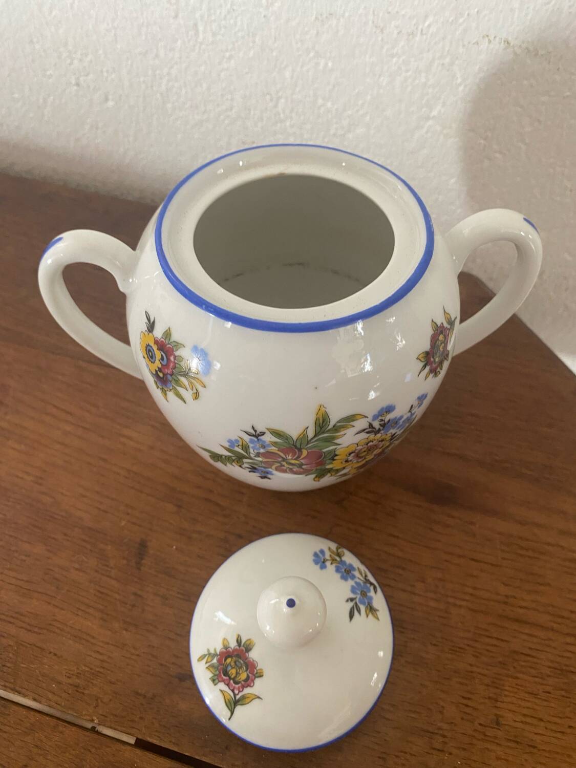 Large sugar bowl with floral porcelain.