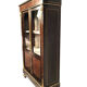 Varnished wood showcase and gold decoration in imitation of the so-called Boulle marquetry