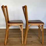 Four chairs Baumann 1960 with bars seated skaï brown label