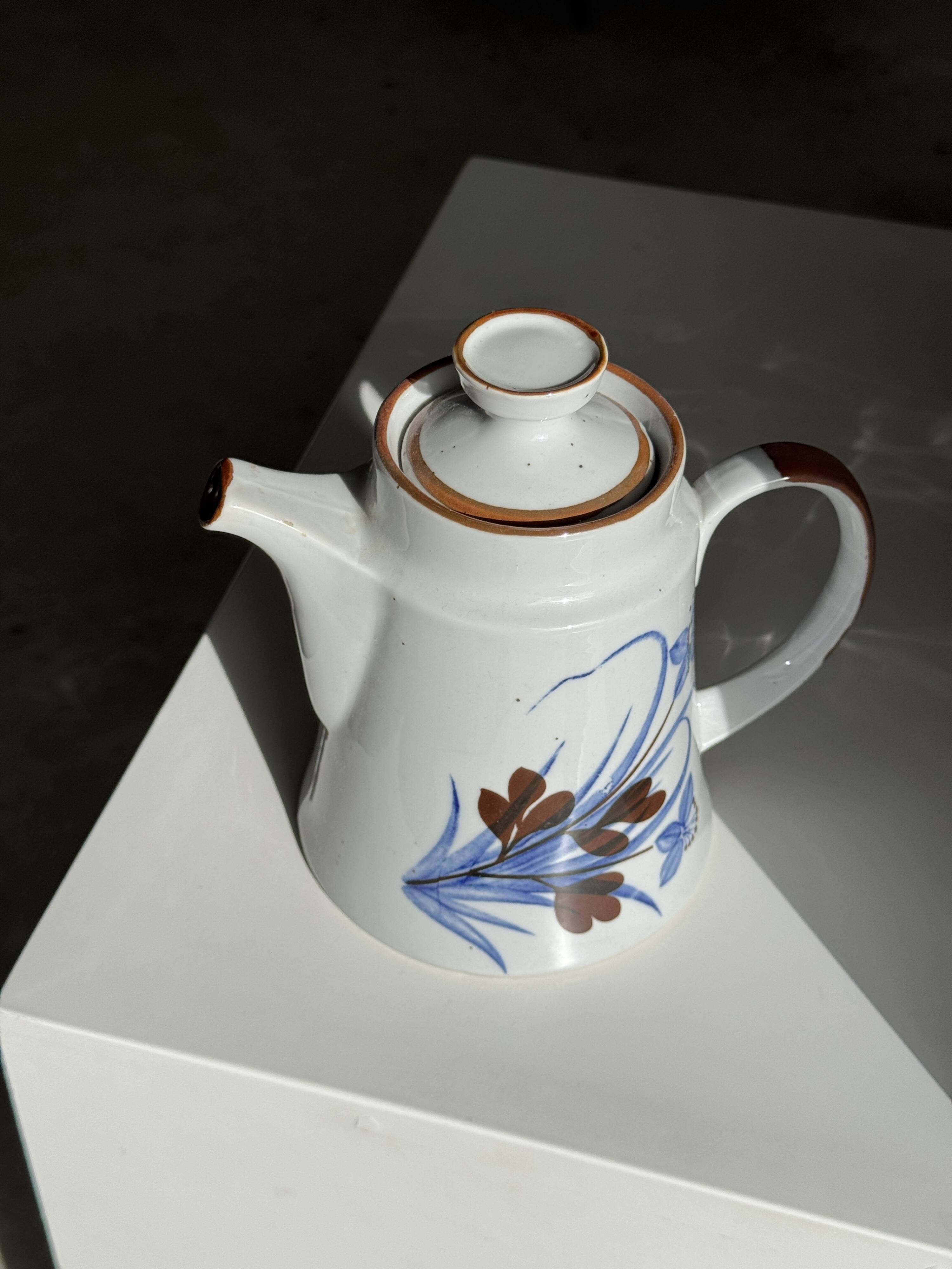 Teapot with stylised blue and brown flowers H18
