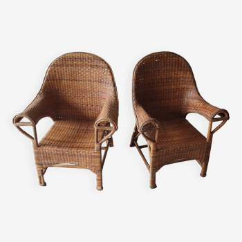 Pair of woven wicker armchairs