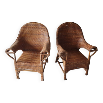 Pair of woven wicker armchairs