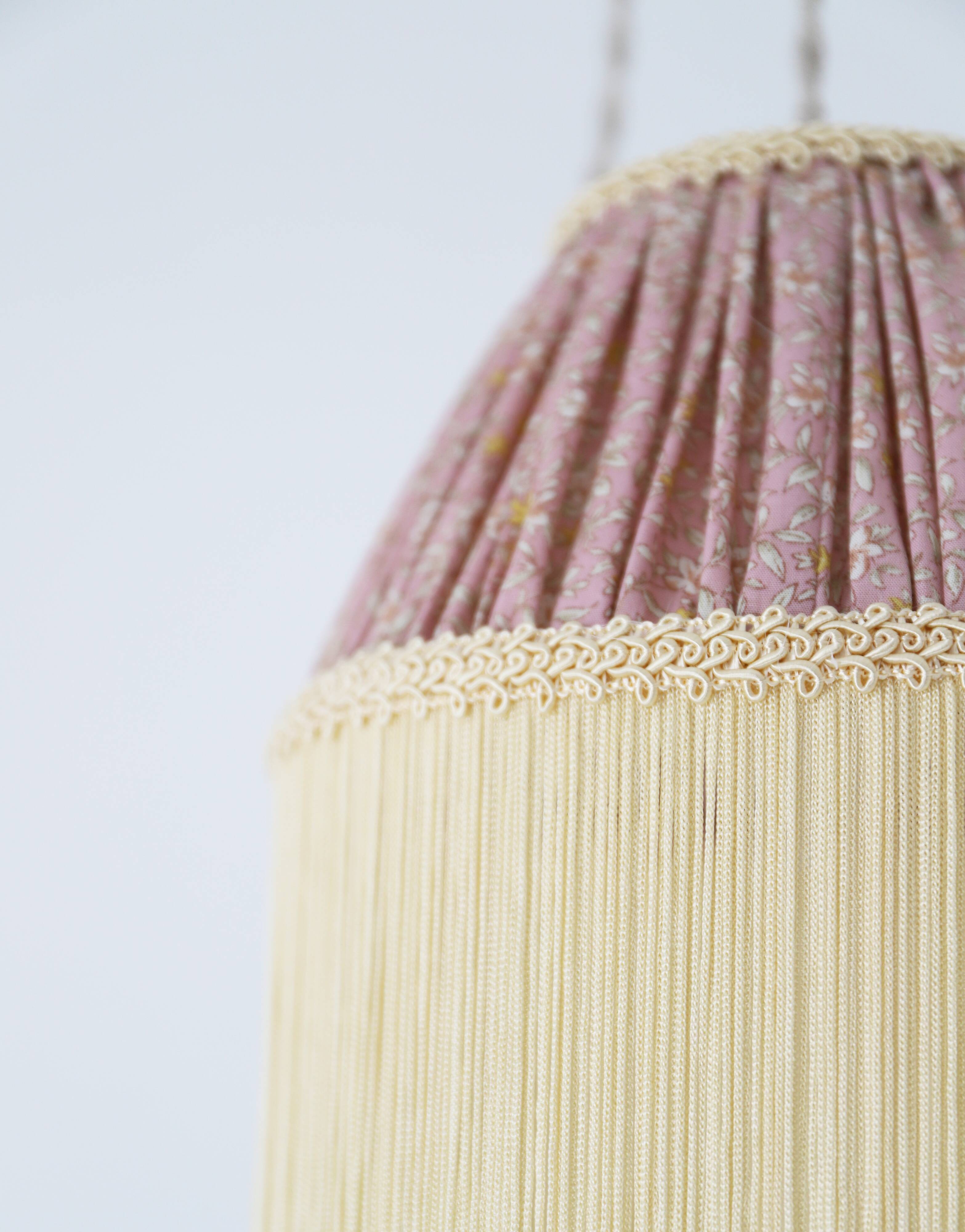 Small floral portable lamp with fringed finish