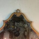 Gold metal wall mirror, in the style of Maison Baguès, Paris circa 1950.