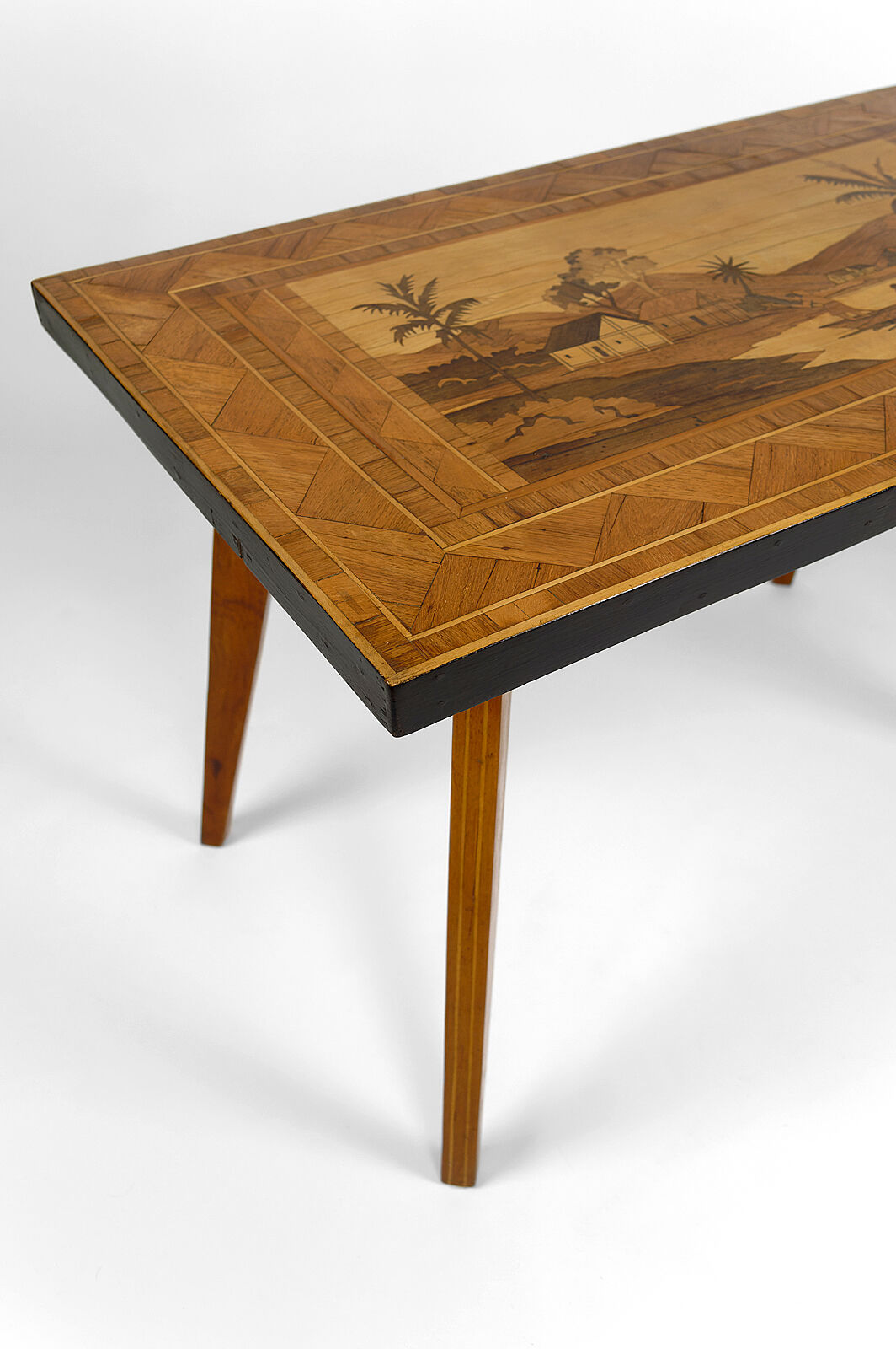 African Midcentury coffee table in inlaid wood, circa 1960