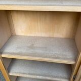 Parisian glass-fronted wardrobe in light wood from the 1960s.