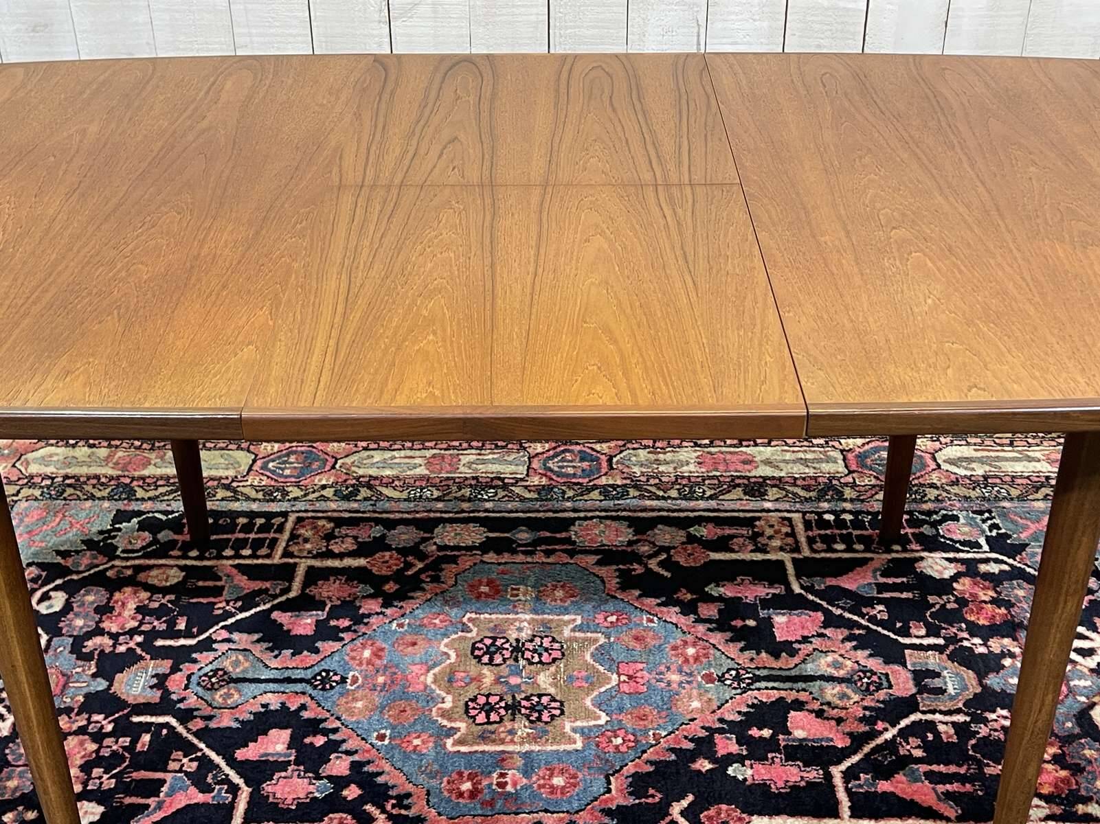 G-Plan teak table from the 1970s with butterfly extension.