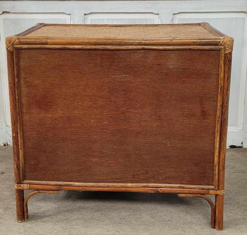 Chest of drawers made of wood, rattan and bamboo.