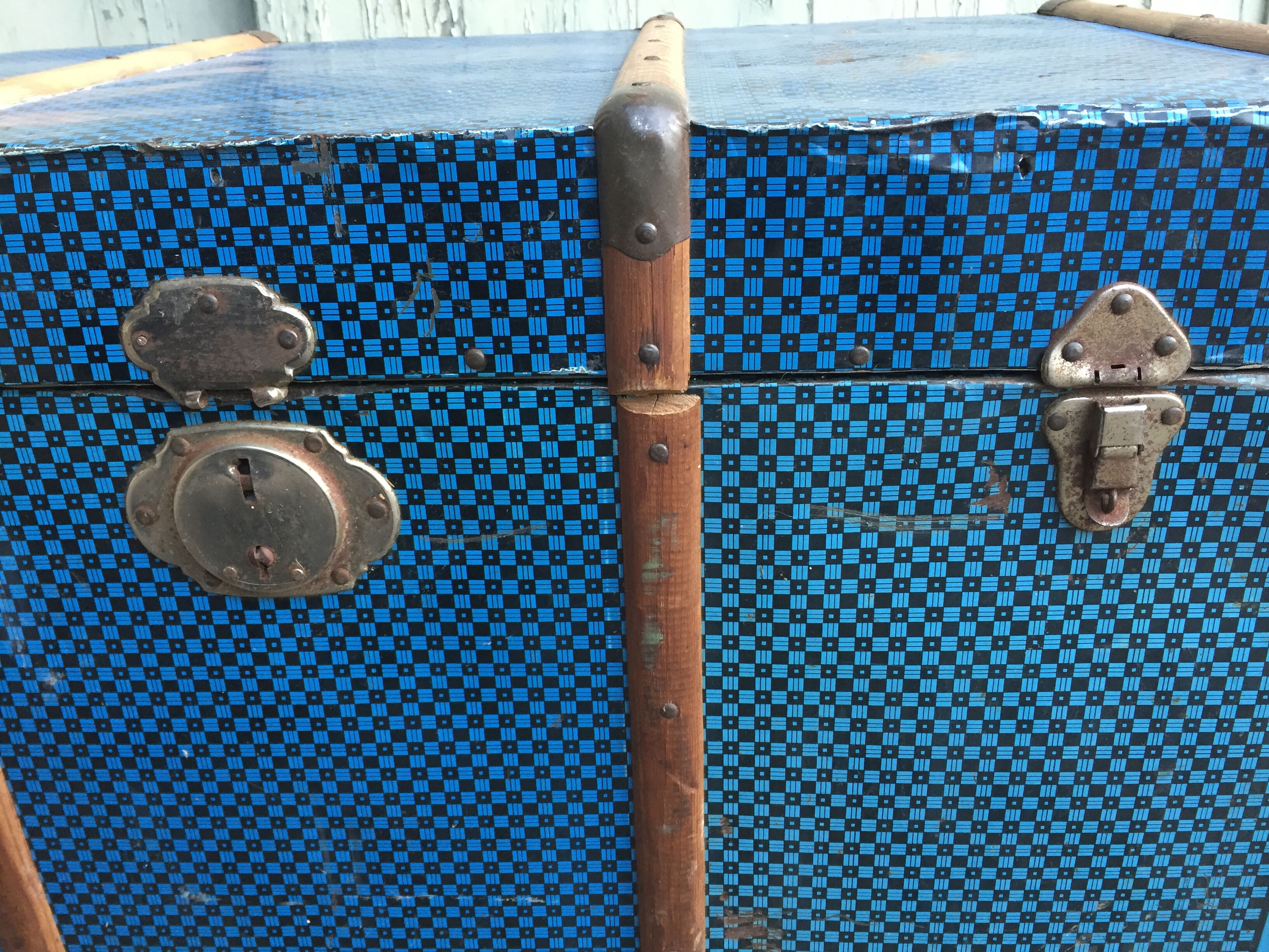 Large blue trunk made of metal and wood