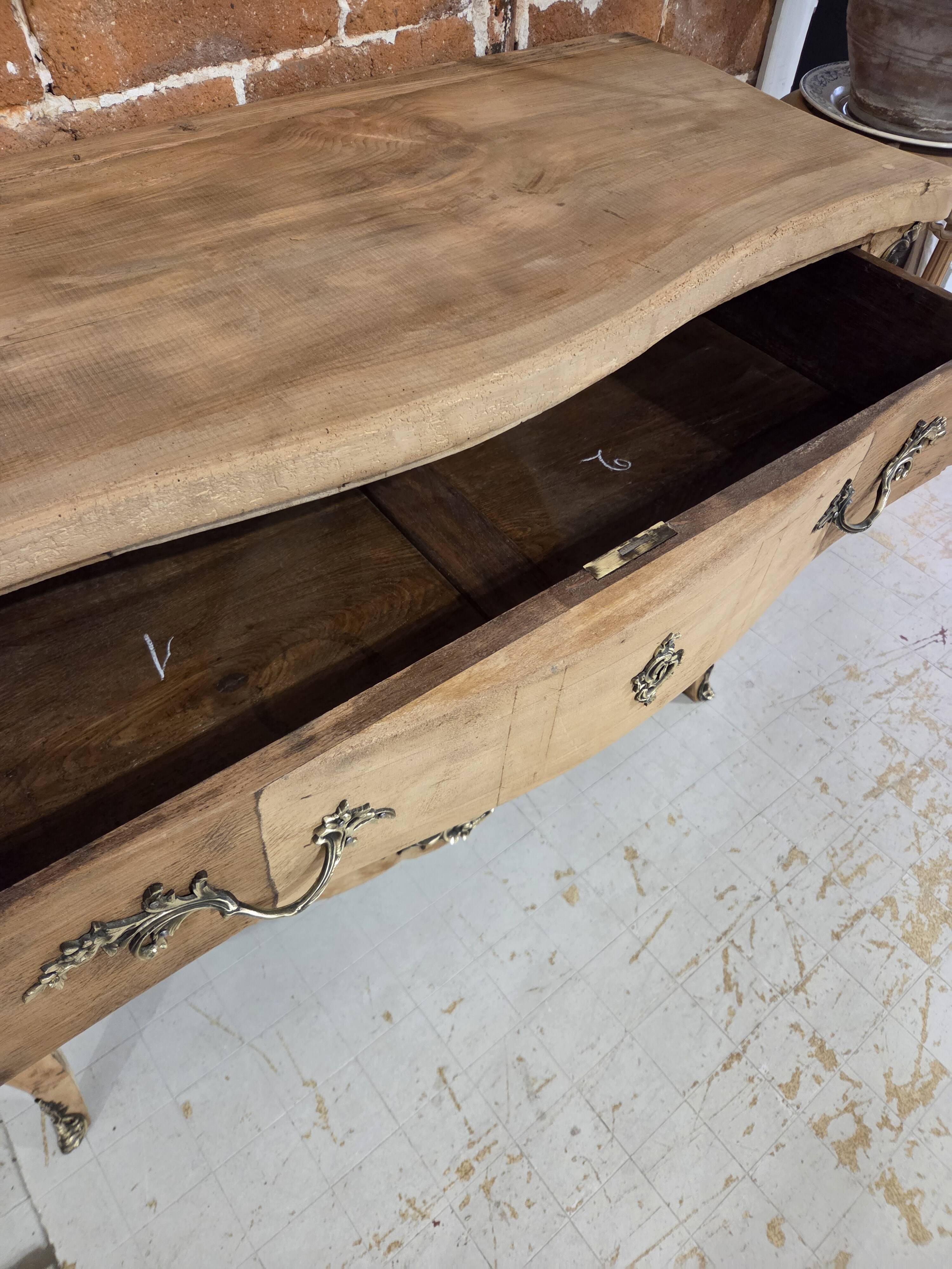 Stripped chest of drawers with bronze handles