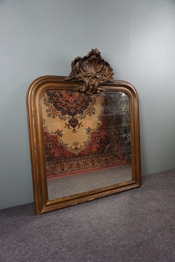 Old French fireplace mirror with beautiful ornament