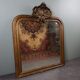 Old French fireplace mirror with beautiful ornament