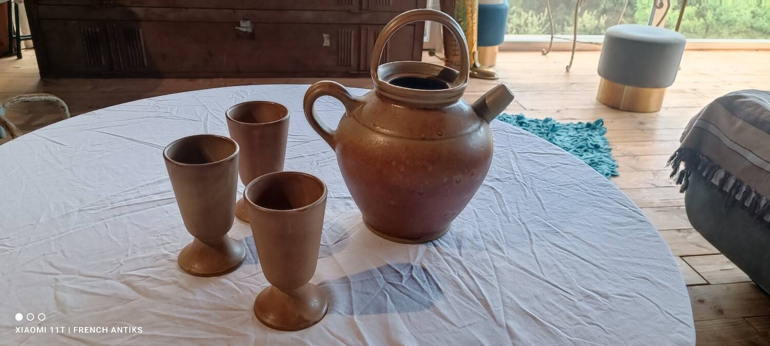 Iridescent carafe and 3 stoneware mazagrans from Digouin. Handmade work.