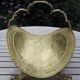 Old brass log holder