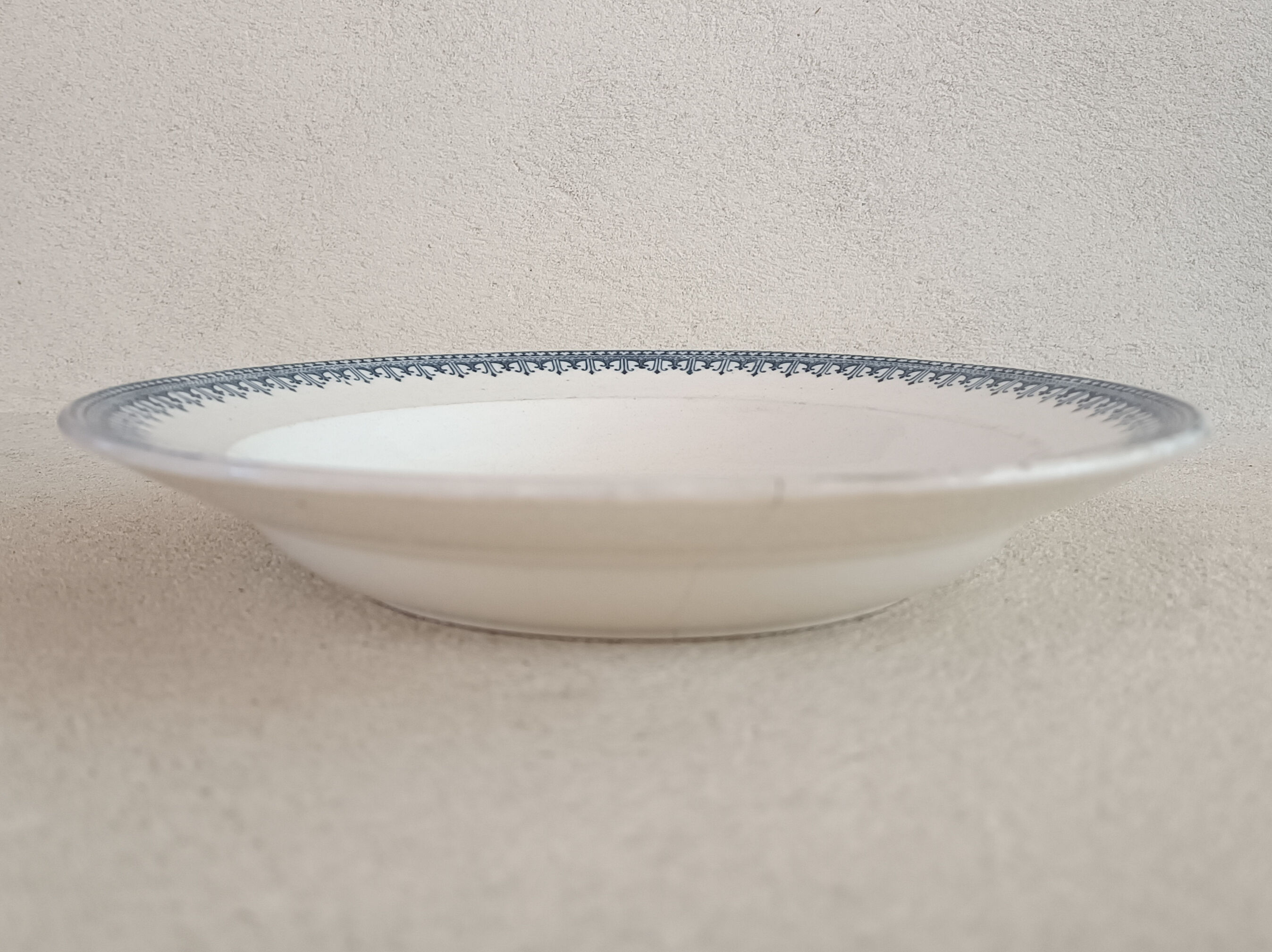 Plate iron earth monogram B