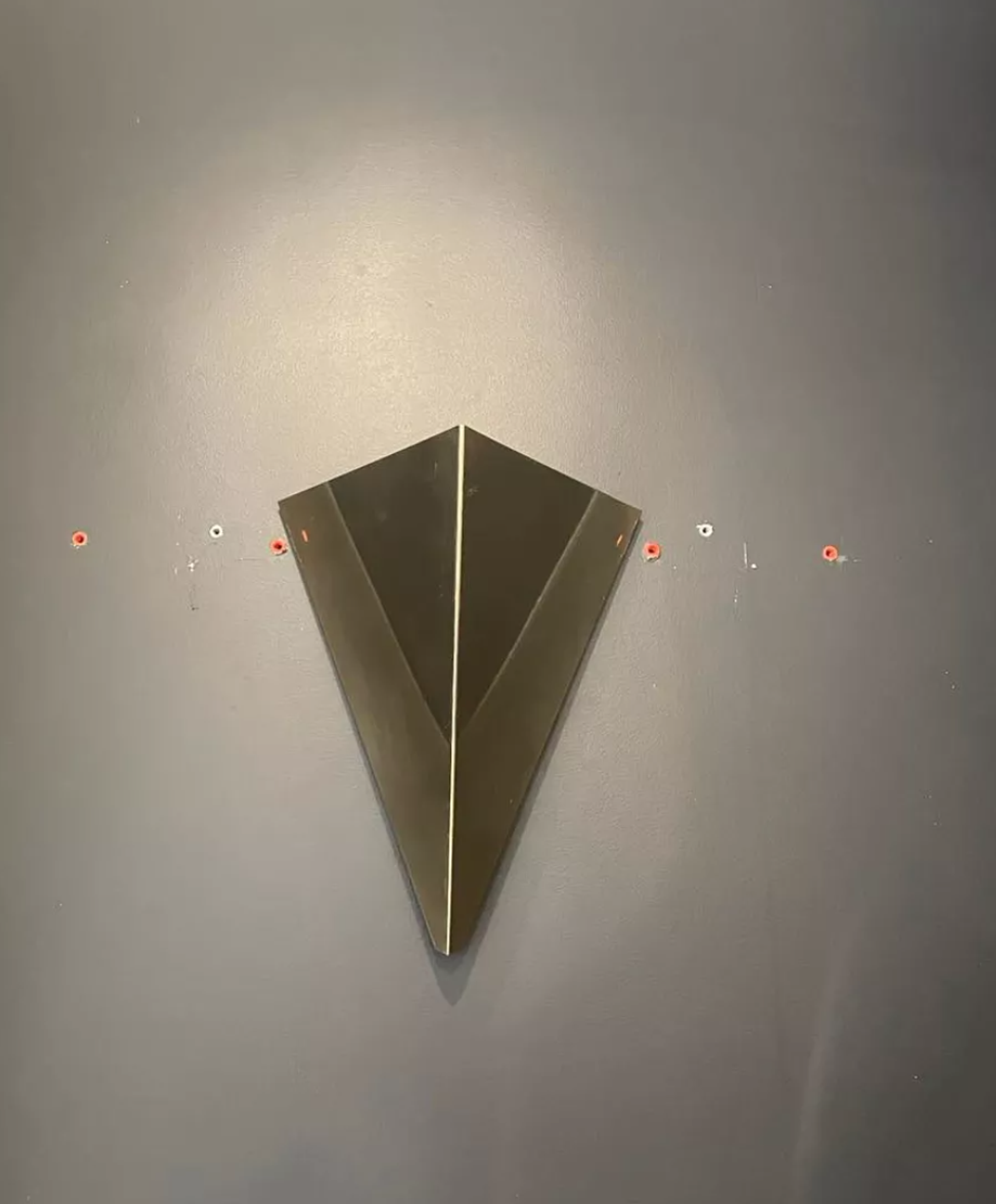 Pair of geometric vintage wall lamps in solid brass, France 1970.