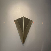 Pair of geometric vintage wall lamps in solid brass, France 1970.