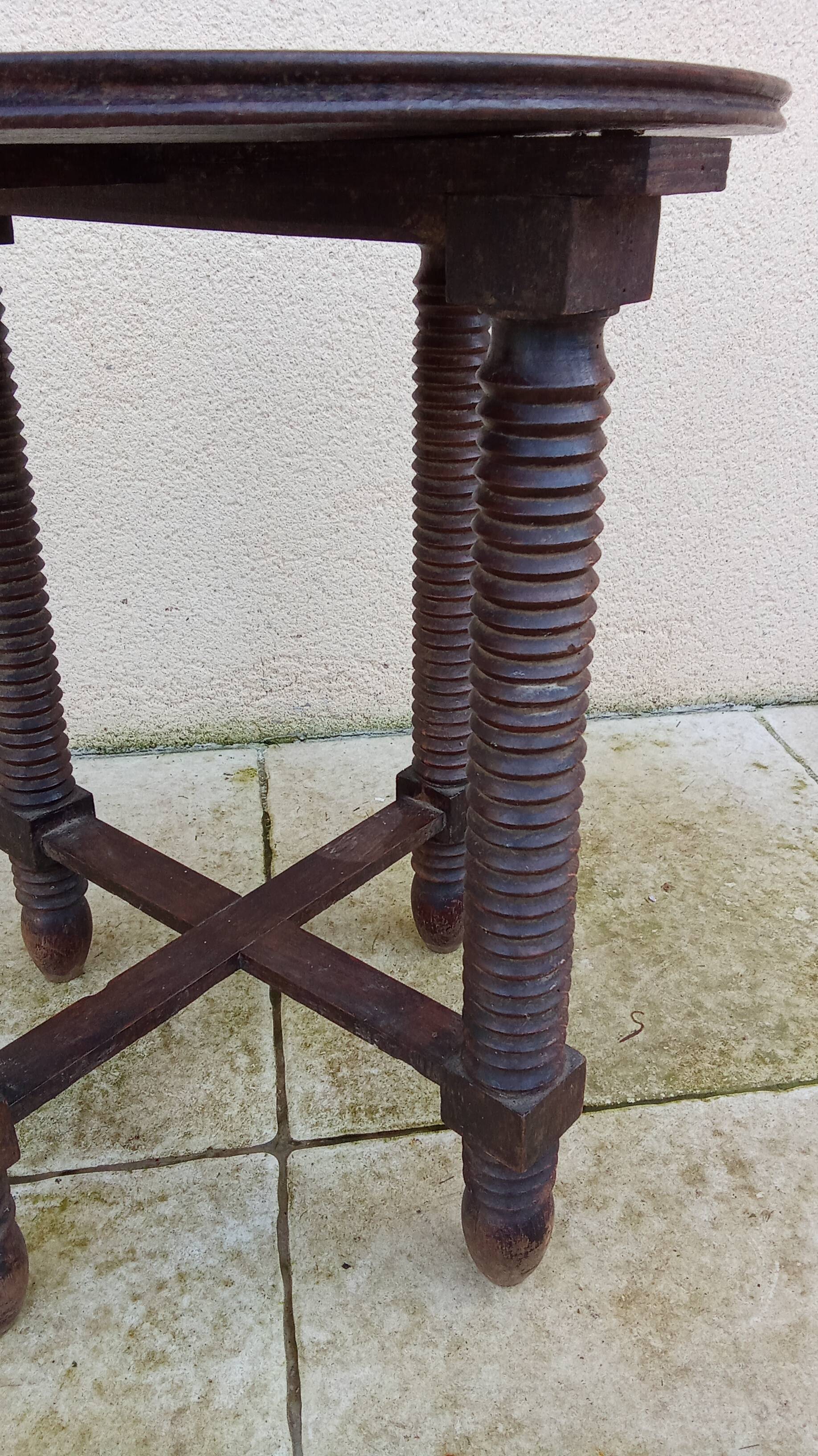Old small round side table in Dudouyt style