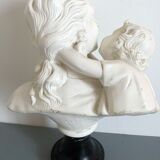 Sculpture in plaster, young mother and child