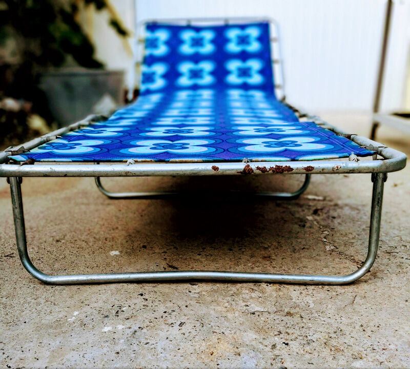 Camp bed or vintage sunbathing