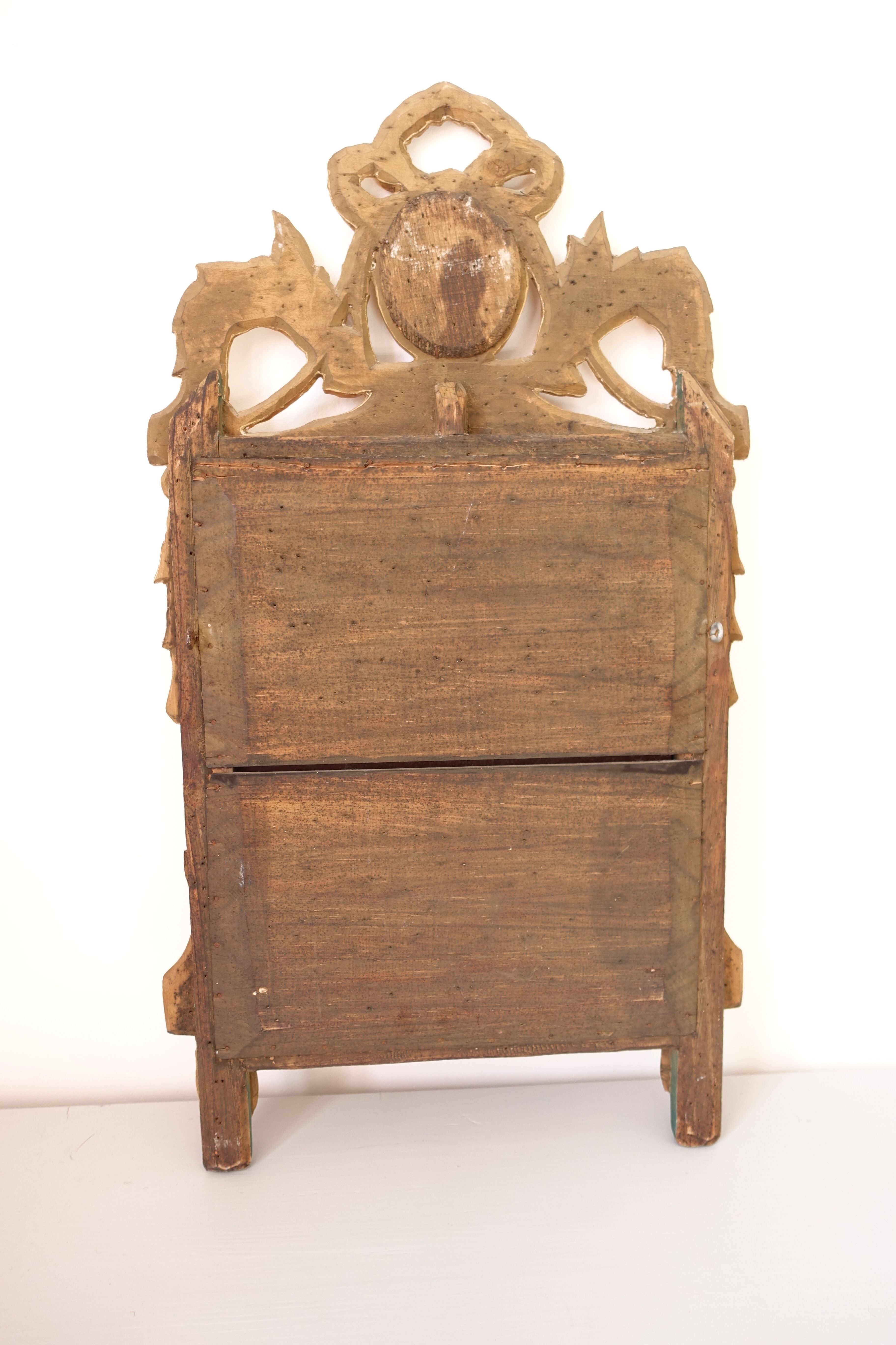 Miroir Louis XVI en bois doré 35x 65cm