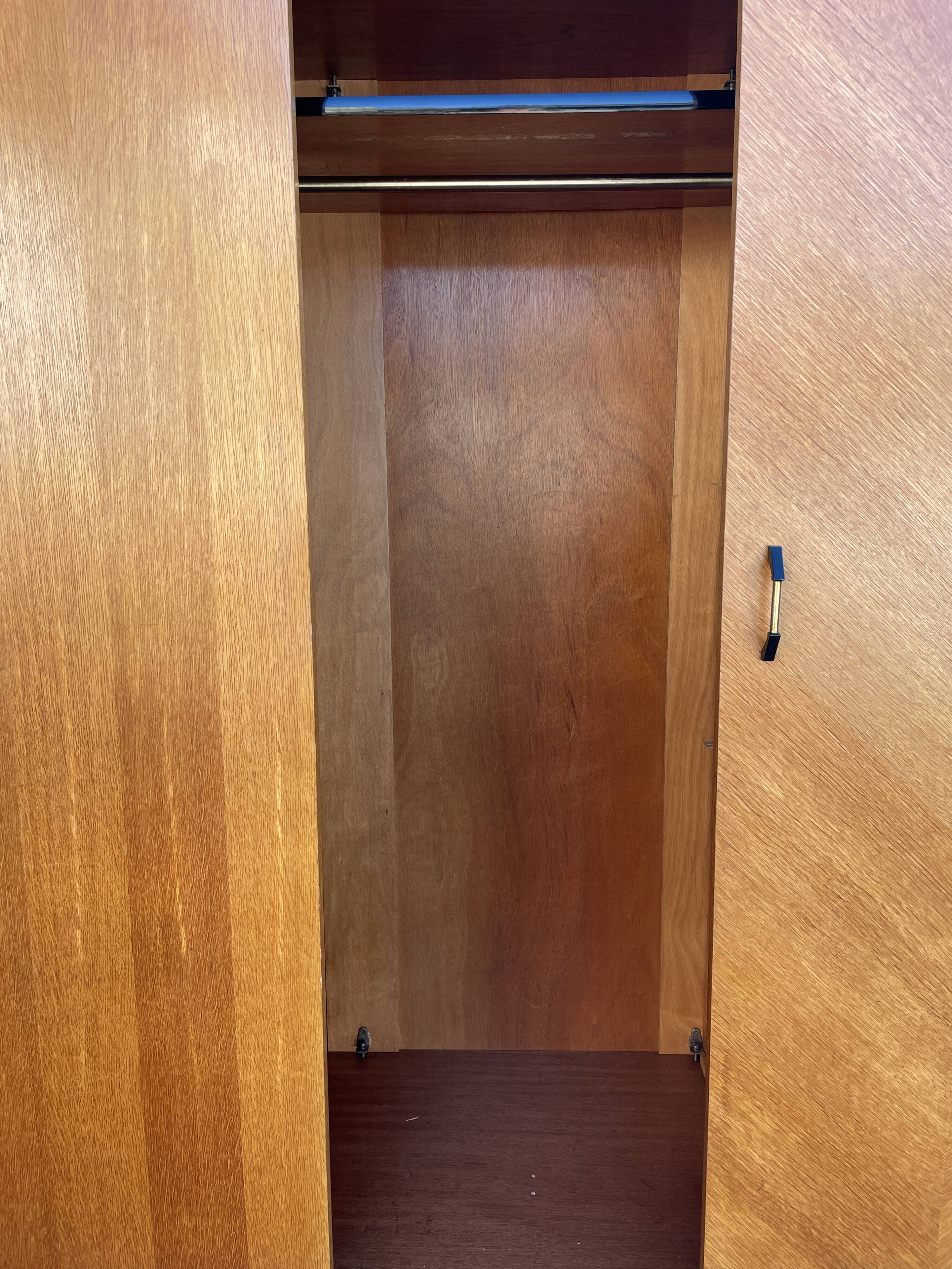 Light oak sliding door wardrobe, 1960
