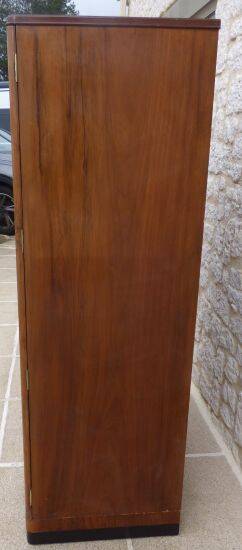 Wardrobe on a plinth in walnut and walnut veneer circa 1940.