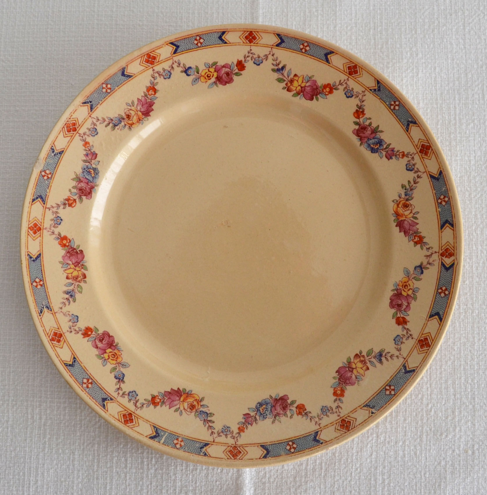 4 old flowered iron earth dessert plates