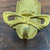 Brass coat hooks
