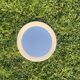 Vintage round white plastic mirror