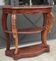 Old curved wooden console