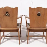 Pair of brutalist oak throne chairs with rush seats – Netherlands, 1930s