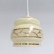 Evoking memories and enjoying a major comeback: this beige-colored glass ce