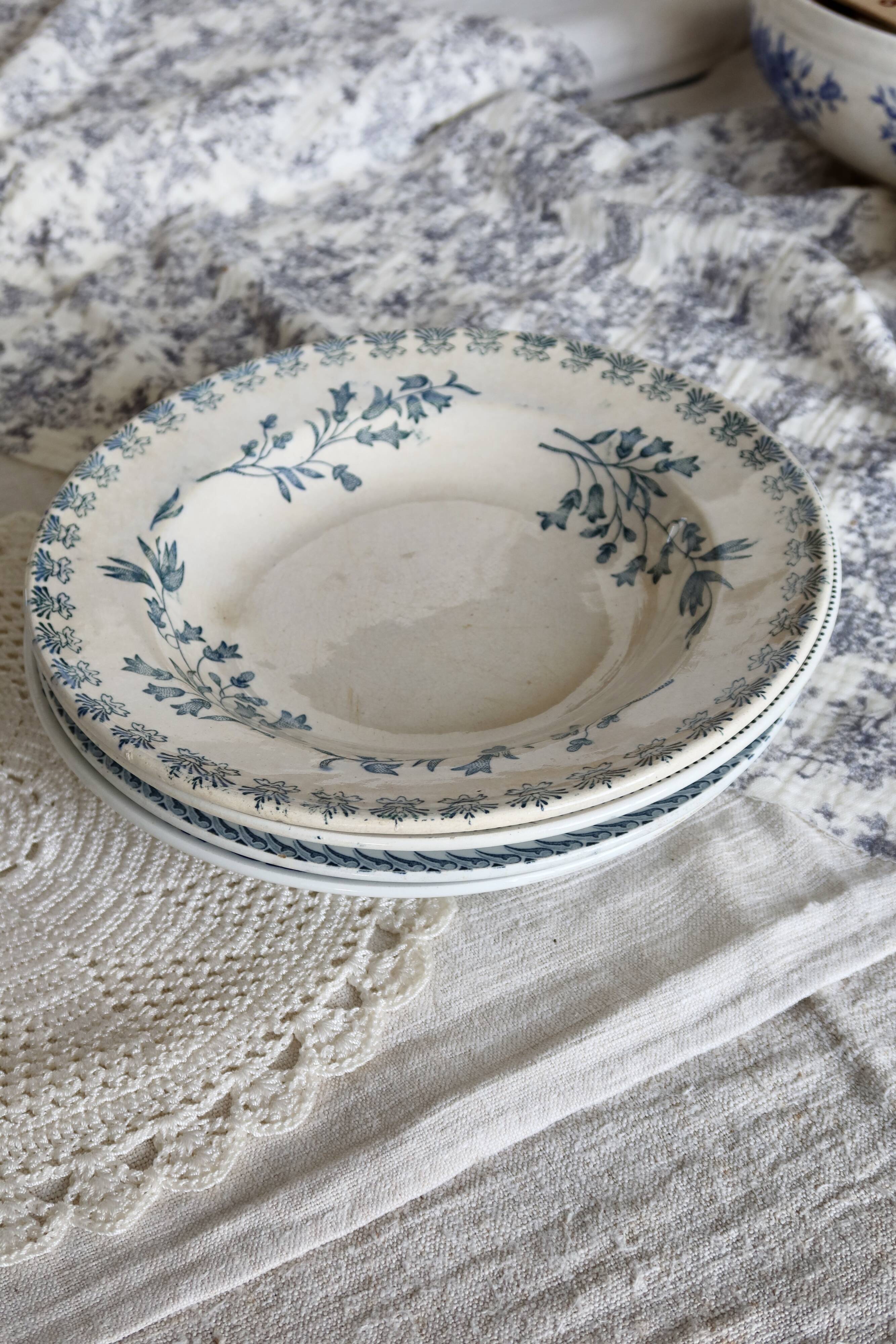 4 vintage blue ironstone soup plates