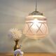 Suspension globe vintage art déco en verre rose et doré