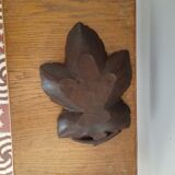 Empty carved wooden pocket black forest style vine pampre
