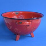 Vintage red enameled sheet metal colander