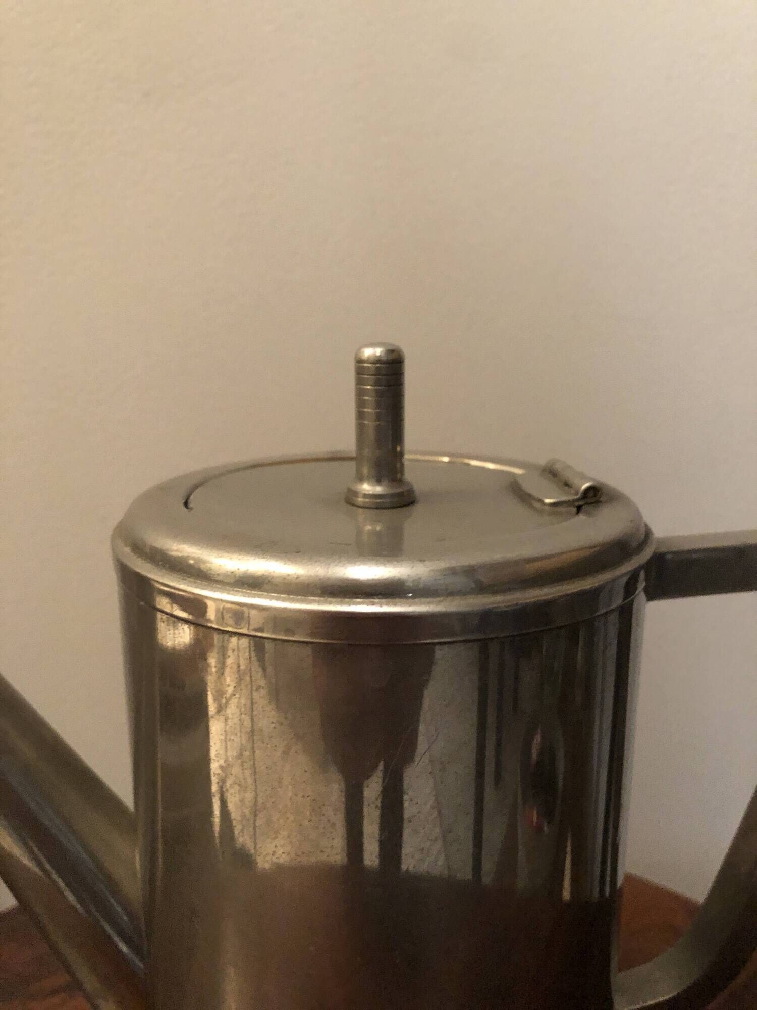 Stainless steel teapot in Art Deco style