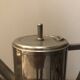 Stainless steel teapot in Art Deco style