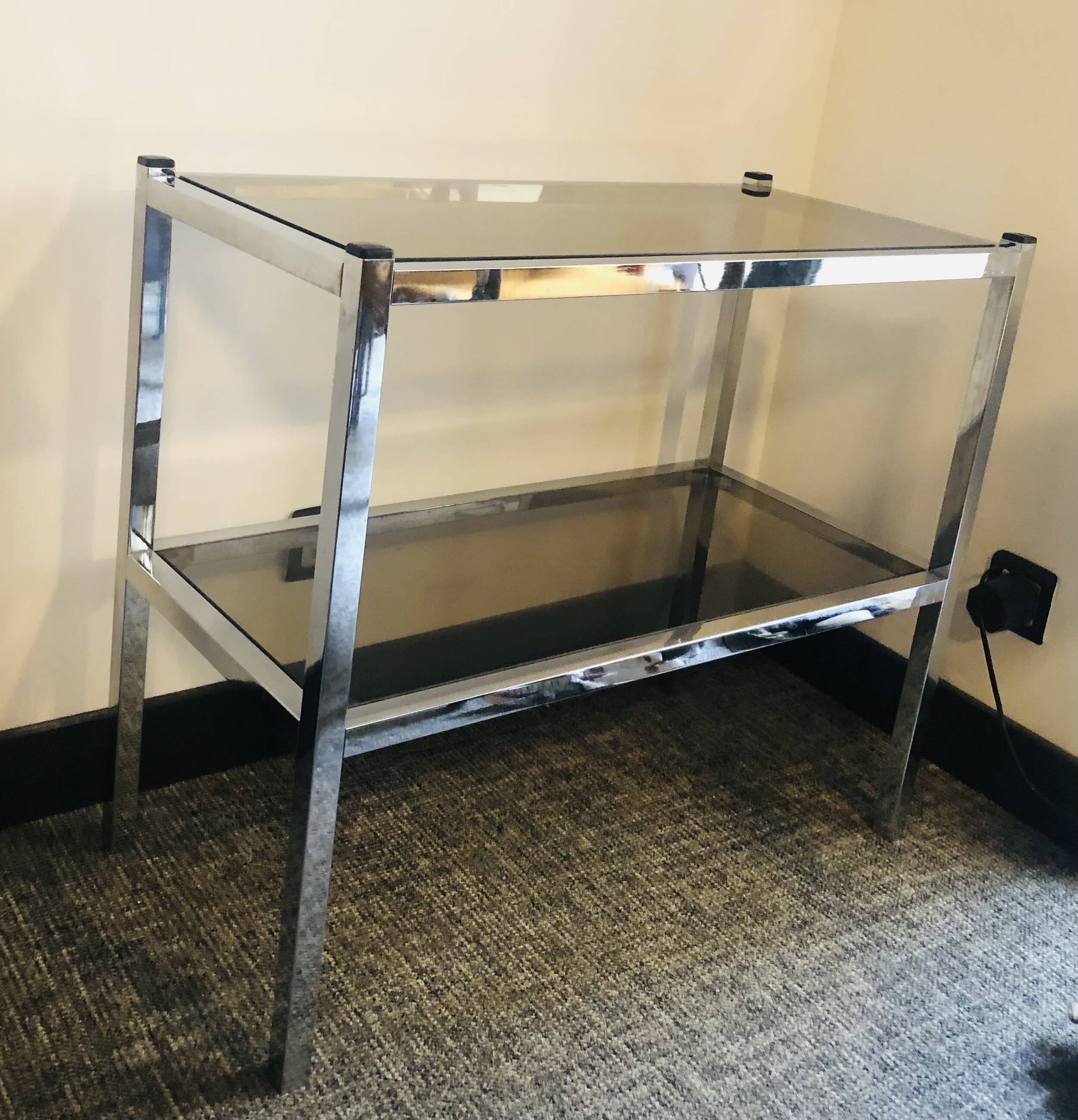 Chrome console and tinted glass