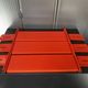 Modular red metal wall shelf in Congresso Lips Vago style.