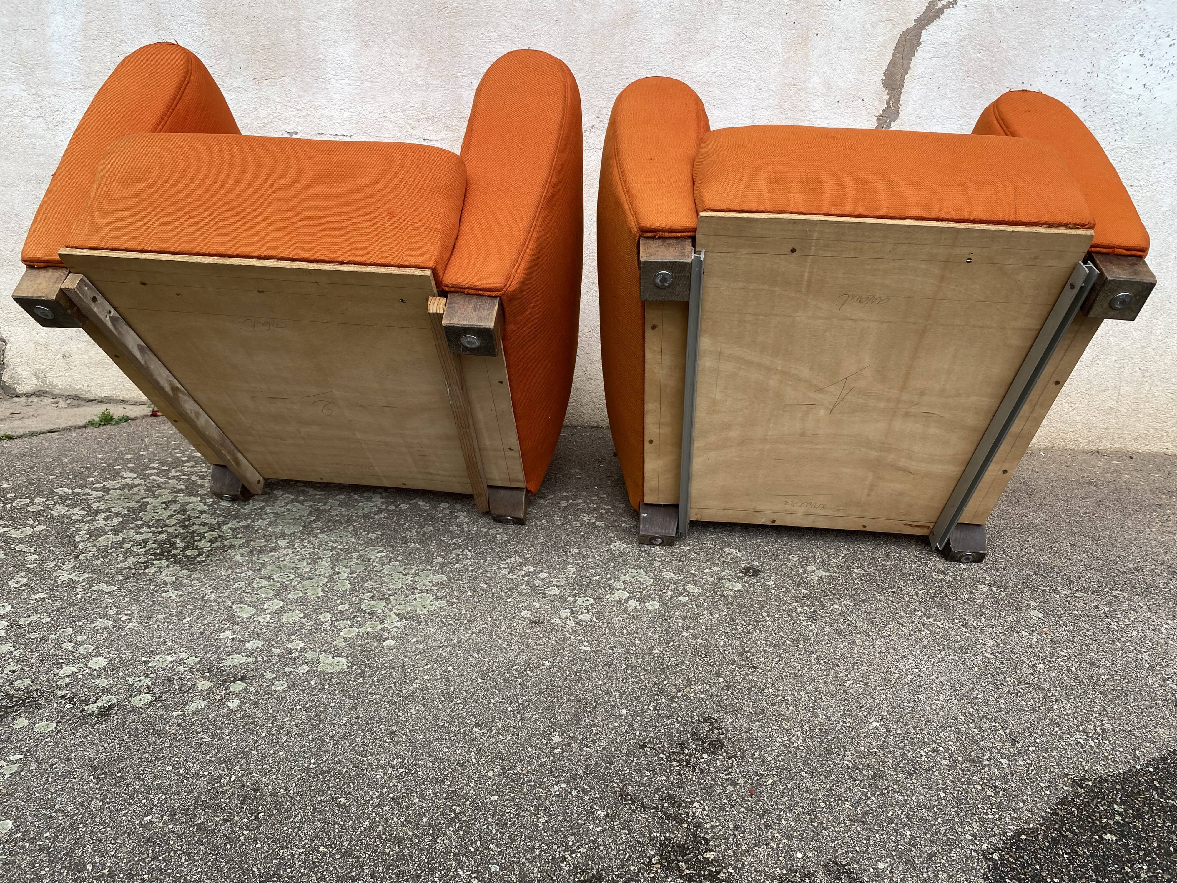 Pair of vintage orange club chairs