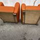 Pair of vintage orange club chairs