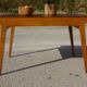 Extendable table, compass legs