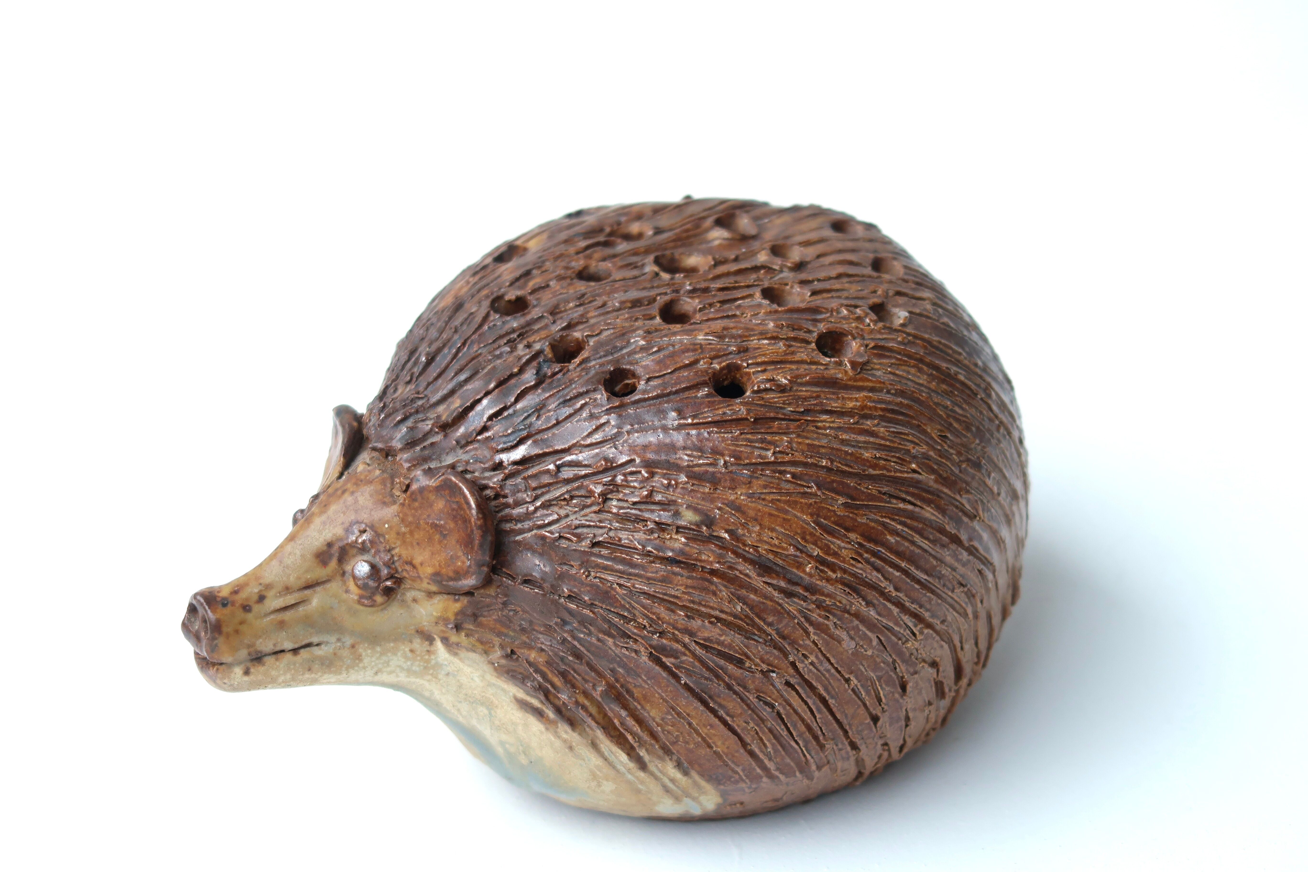 Ceramic hedgehog flower pick by Jacky Coville
