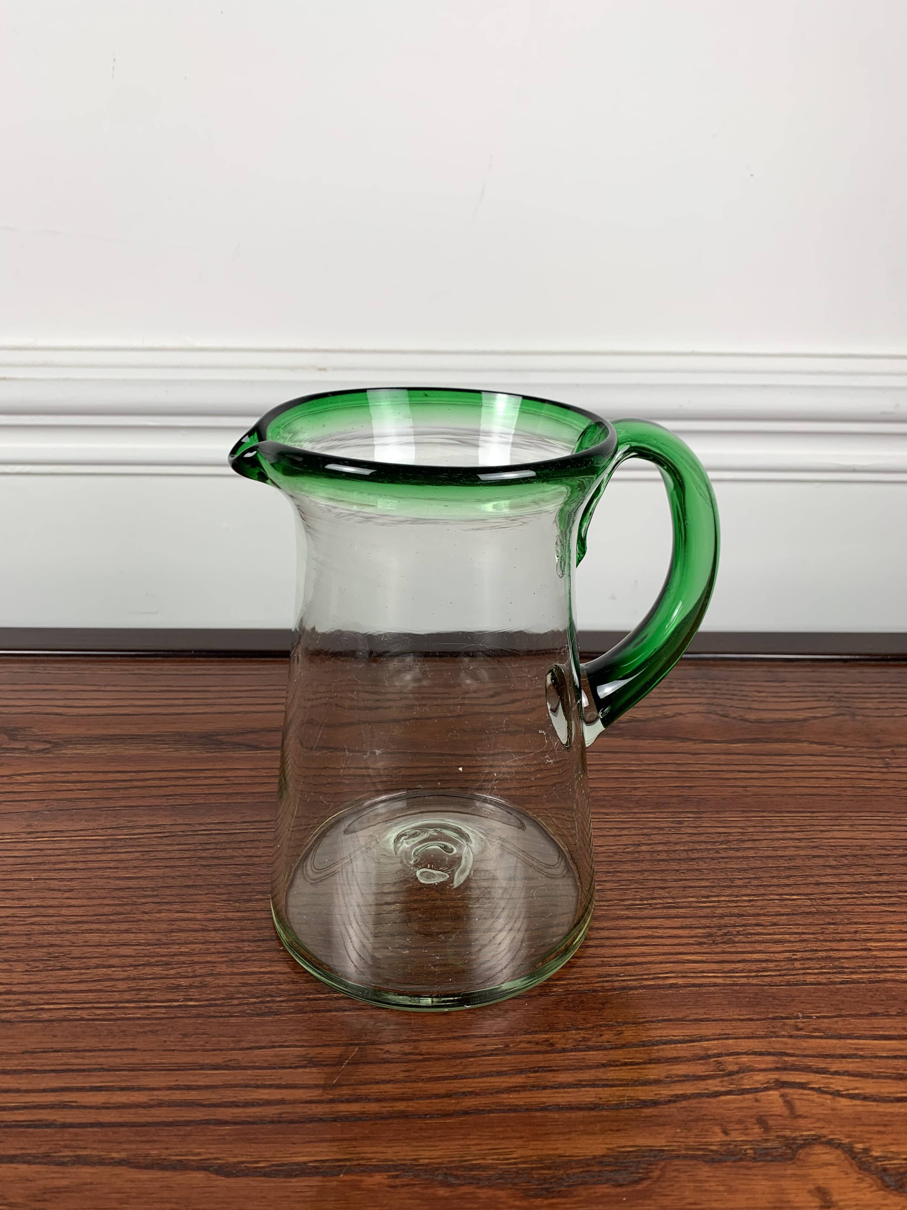 Vintage blown glass jug, green border