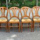 4 country-style Louis Philippe medallion chairs with rush seats from the 1970s.
