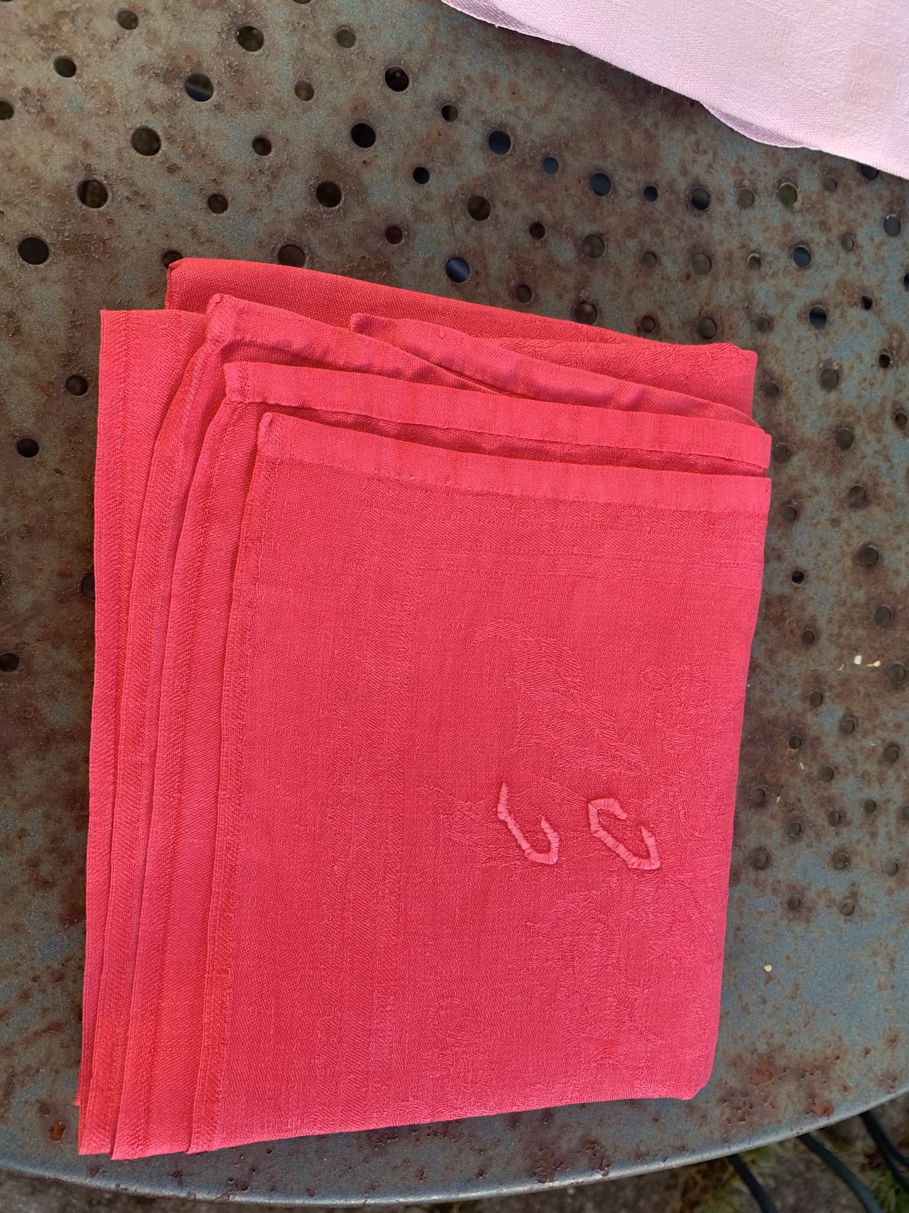 Duo set, consisting of two large pink-dyed cotton and linen towels, embroidered, TK monograms