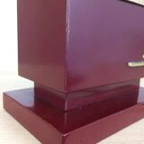 1980s vintage lamp base in red wood and gold metal.