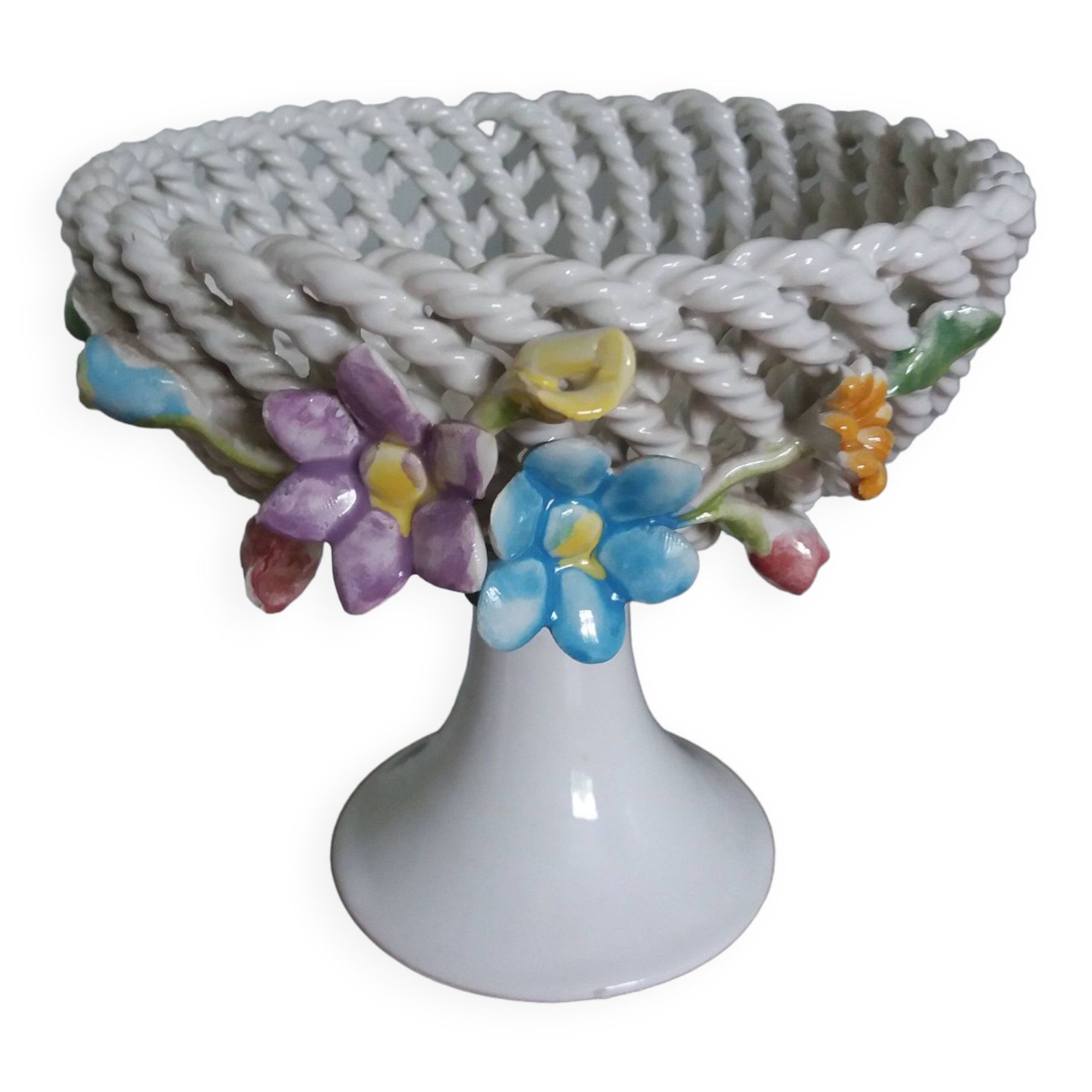 Cup on woven ceramic base with slip flowers